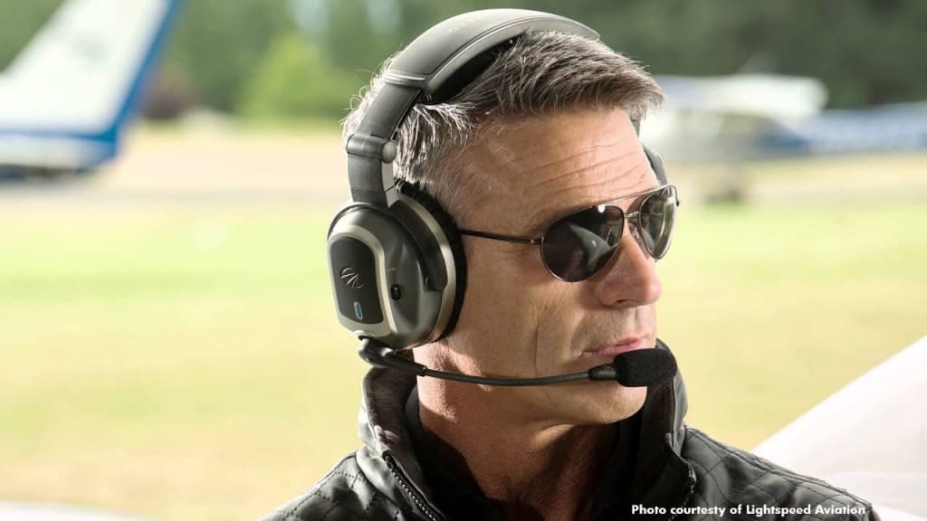 Image of Model pilot wearing the LIGHTSPEED TANGO Wireless Headset